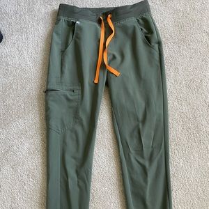 Figs green joggers with orange tie